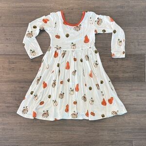 Kyte baby twirl dress in pumpkin